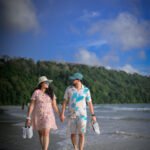 Alt: Short rainforest walk to shaded coves (with local guide).